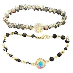 𝅺2 Like New Bracelets each with 1 stone